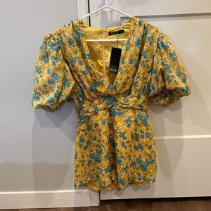 Romper NEVER WORN TAGS ON!!